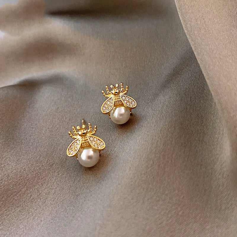 Pearl Bee Stud Earrings – Elegant Gold-Tone Jewellery for Women