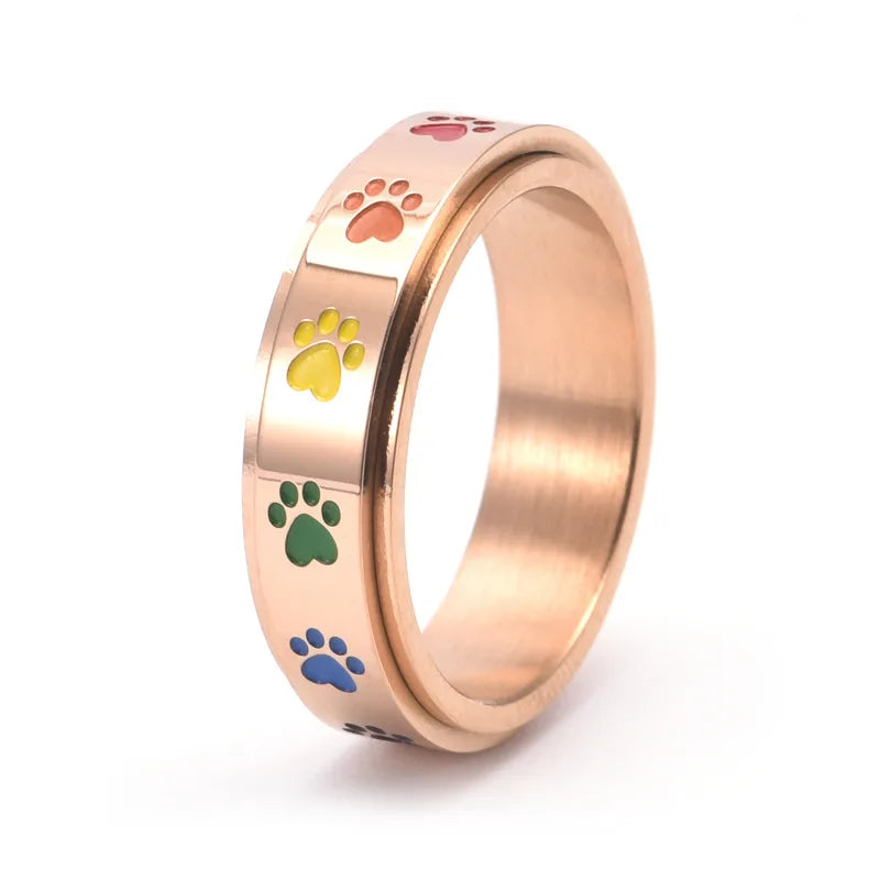 Rotating Anti-Stress Paw Ring – Stainless Steel with Rainbow Paws